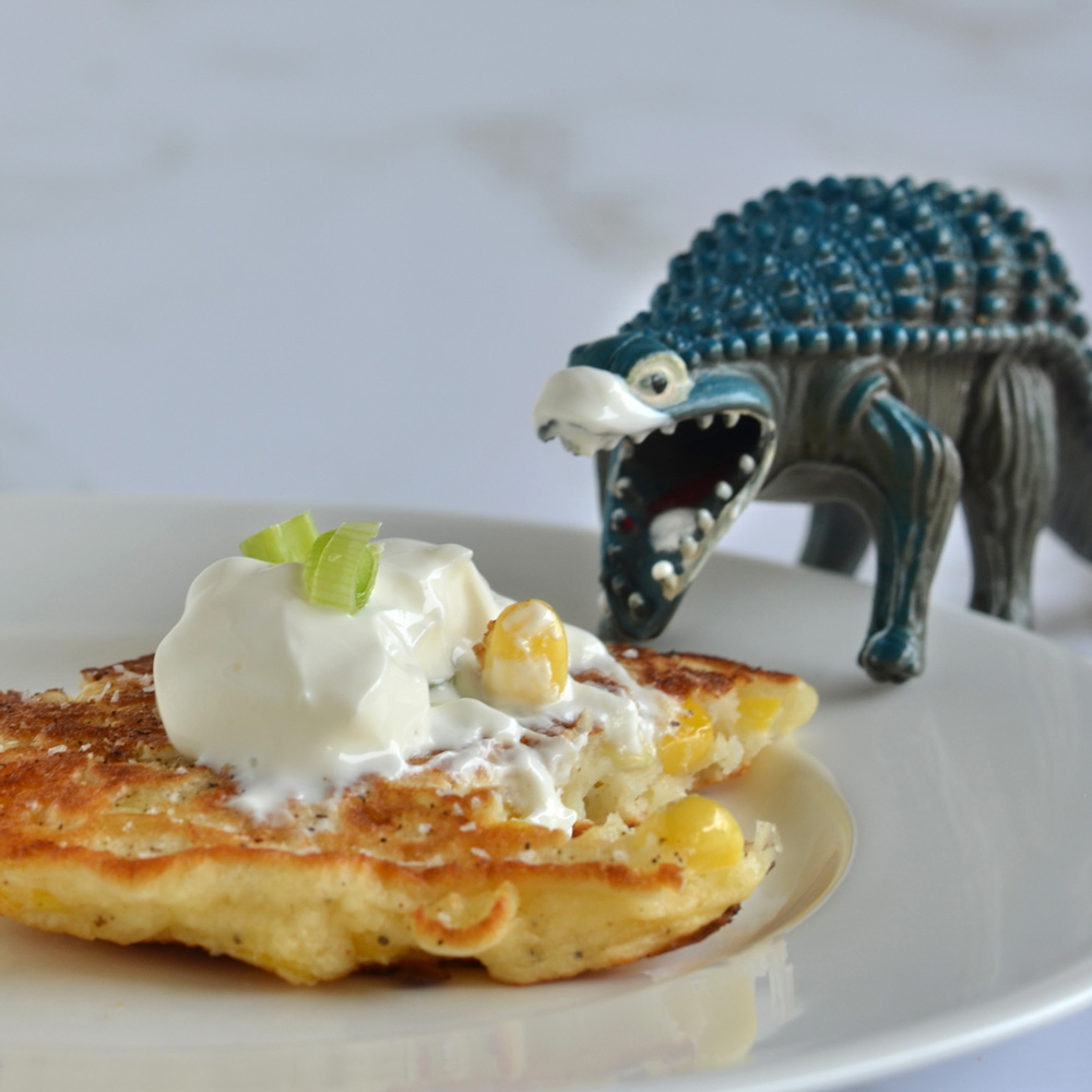 Alex eating corn fritter