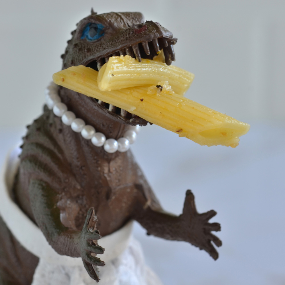 Vickie eating penne pasta