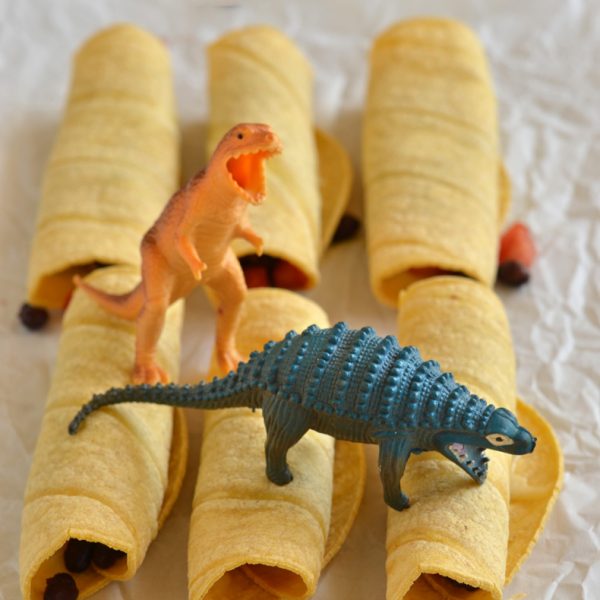 Blondie and Alex inspecting flautas