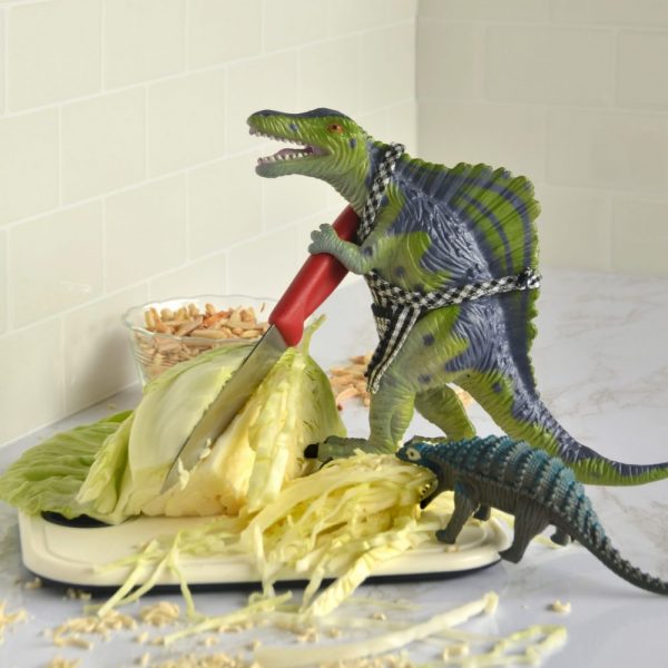 Spino cuts up the crunchy green cabbage